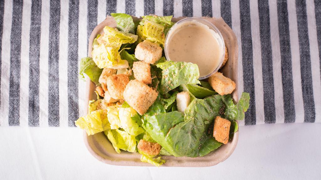 Caesar Salad (Side) · Fresh cut Romaine lettuce tossed with a tangy house made Caesar dressing and topped with croutons and black pepper. (Currently out of Caesar Dressing, will automatically replace with Ranch Dressing unless otherwise noted)