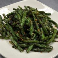 Dried Sauteed String Bean With Minced Pork     干煸四季豆 · Hot & spicy.