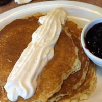 Blueberry Pancakes · Blueberries mixed into the batter and topped with
blueberry compote.