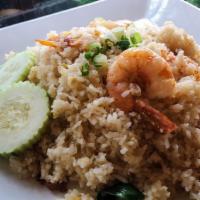Thai Fried Rice · Gluten Free.

Jasmine rice tossed with eggs, tomatoes, white & green onions