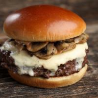 Bounty Hunter Burger · Sautéed mushrooms in truffle butter, pepper jack cheese and mob sauce.