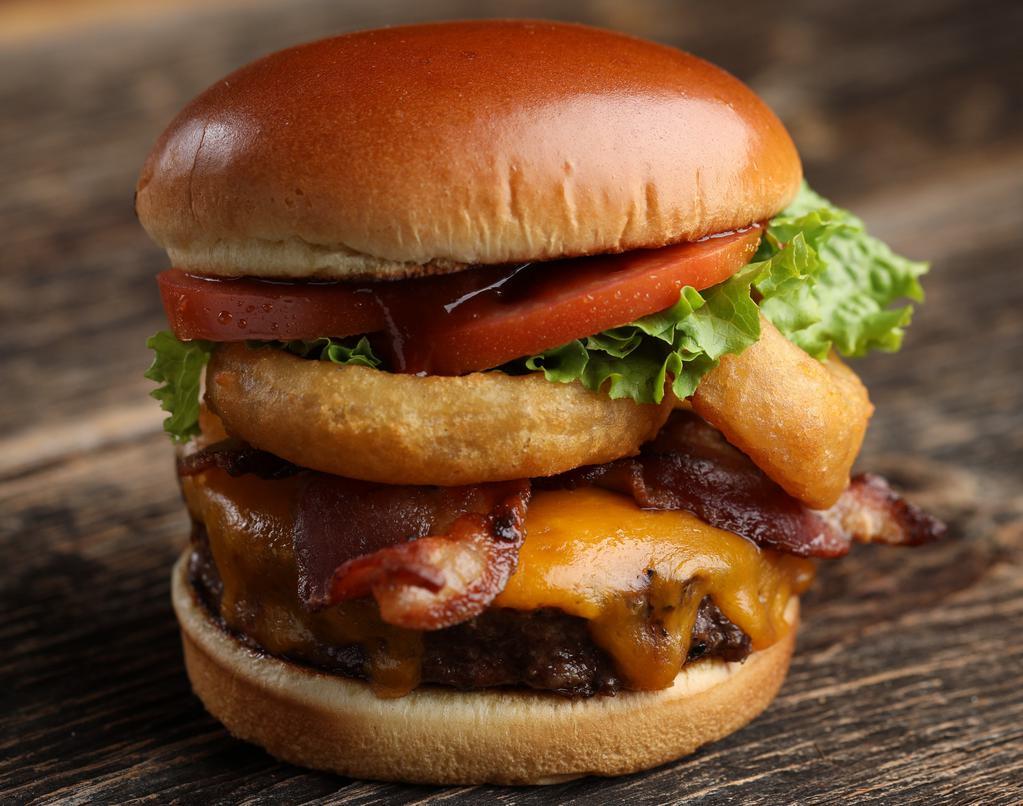 Butch’S Wild Bbq Burger  · BBQ sauce, cheddar cheese, bacon, onion rings, lettuce and tomato.