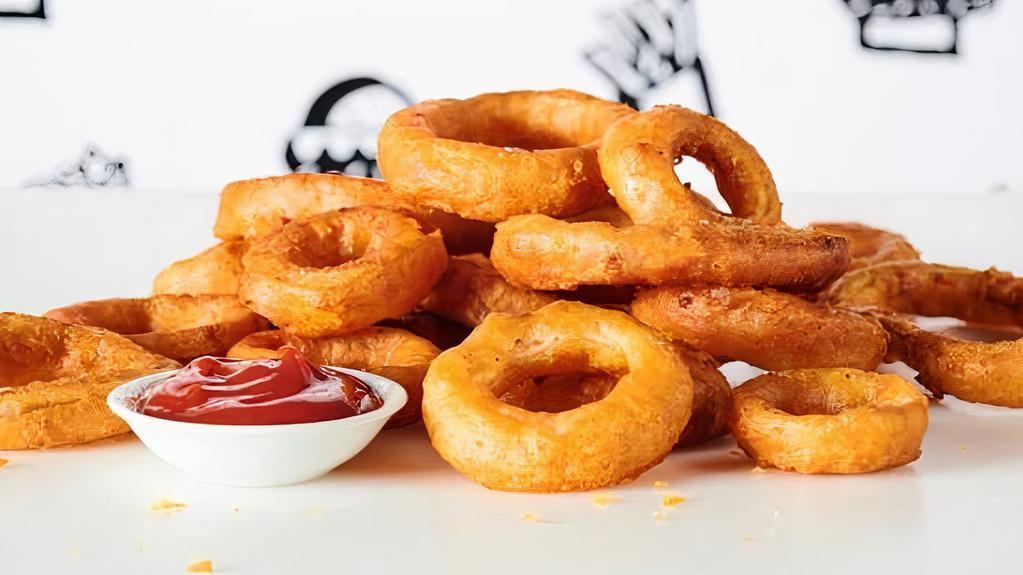 Onion Rings · Thick onion rings battered & fried to perfection