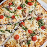 The Herald Pizza · White sauce, mozzarella, chicken, grape tomato, ricotta, red onion, mushroom, and finished w...