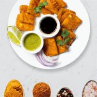 Edgy Veggie Pakoras · Assortment of vegetables marinated in gram flour and spice fried.