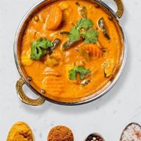 Navrattan Korma · Mix it up with vegetables cooked in delicate fresh spices, tomatoes and onions.