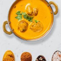 Spicy Malai Kofta · Veggie balls cooked in an Indian masala curry and garnished with ground spices.