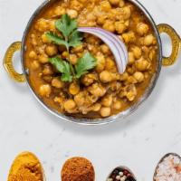 Chosen Chana · Garbanzo beans with ginger in a specially spiced sauce.