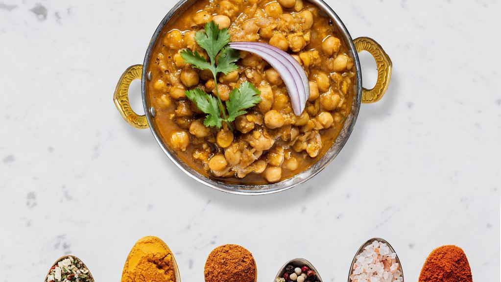 Chosen Chana · Garbanzo beans with ginger in a specially spiced sauce.