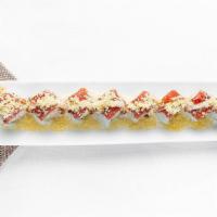 Sushi Train Roll · Crab, avocado, cucumber, shrimp tempura and cream cheese roll. Topped with tuna.