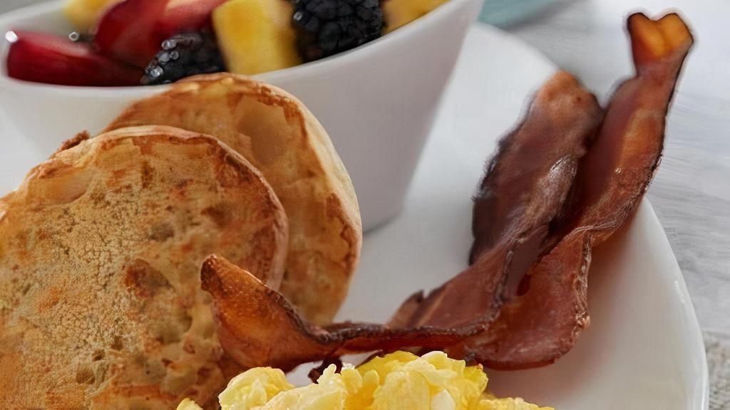 Traditional Day Starter · Two eggs any style with your choice of baked bacon, house-made sausage patties, andouille sausage, maple apple chicken sausage or sweet ham.  Served with an English muffin.