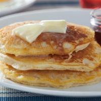 Buttermilk Pancakes · Three house-recipe buttermilk cakes.