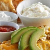 Hey Lucy!® Omelette · Chorizo, onions and green chilies omelette, topped with Cheddar Jack cheese and avocado. Sid...