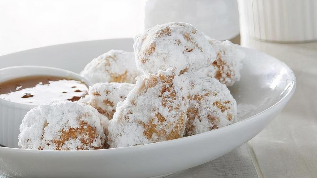 1/2 Order Of Biscuit Beignets · Southern-style beignets with powdered sugar and honey marmalade.