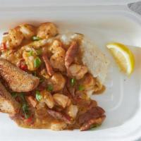 Shrimp & Grits Brunch Box · Gulf shrimp and andouille sautéed with red peppers and onions in a spicy low country reducti...