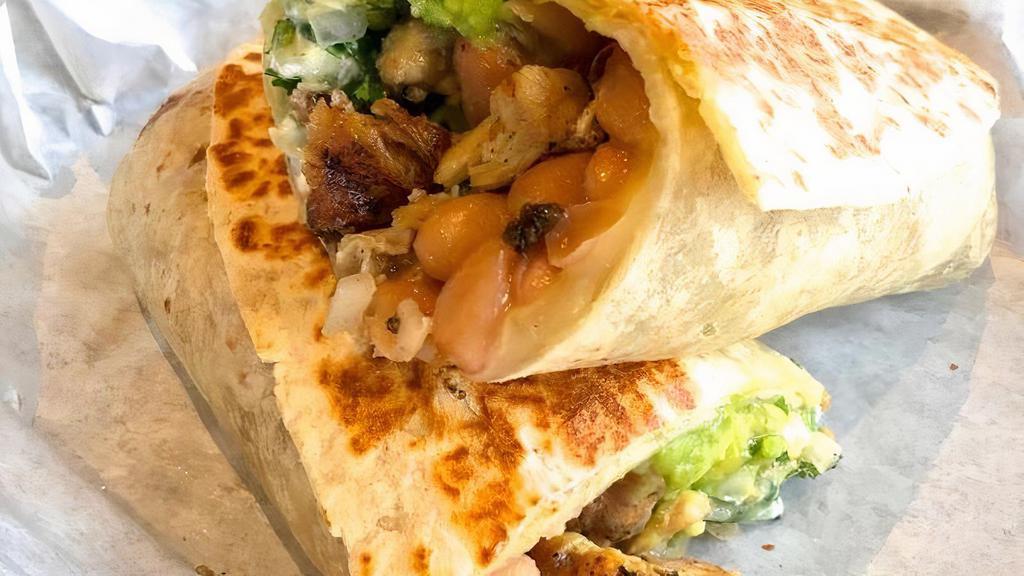 Burrito · Meat, cheese, beans, advocado, sour cream, pico de gallo.. *Shrimp burrito has no beans but has rice and grilled bell peppers and onions.*
