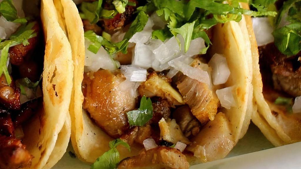 Mini Taco · Meat, onion, cilantro