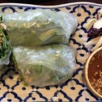 Fresh Spring Rolls (2 Pcs) · Gluten free. Two salad rolls filled with lettuce, basil & cilantro wrapped in a thin rice pa...