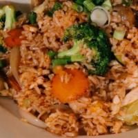House Fried Rice · Our house classic, flaky jasmine rice wok stir fried with crisp julienne vegetables.