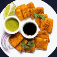 Rampant Paneer Pakora · Lightly battered paneer fried until cripsy on the outside and gooey on the inside.