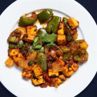 Netflix And Chili · Homemade Paneer cheese cooked with dry chili and bell peppers.