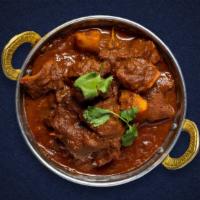 Righteous Vindaloo · Extra spicy anglo-Indian curry, with potatoes. Served with rice.
