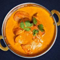 Eureka, Tikka · Traditional tomato and cream sauce made with ginger, garlic, & fenugreek. Served with rice.