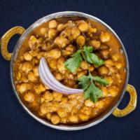 Holla Chana Masala · Garbanzo beans with ginger in a specially spiced sauce. Served with rice
