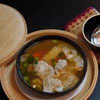 Wonton Soup · Seasoned Shrimp wontons in chicken broth with BBQ pork, Napa cabbage, carrot, and green onion.
