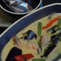 Green Curry  · Spicy. Gang keow. Chicken, beef, or pork with bamboo, green beans, bell peppers, and basil i...