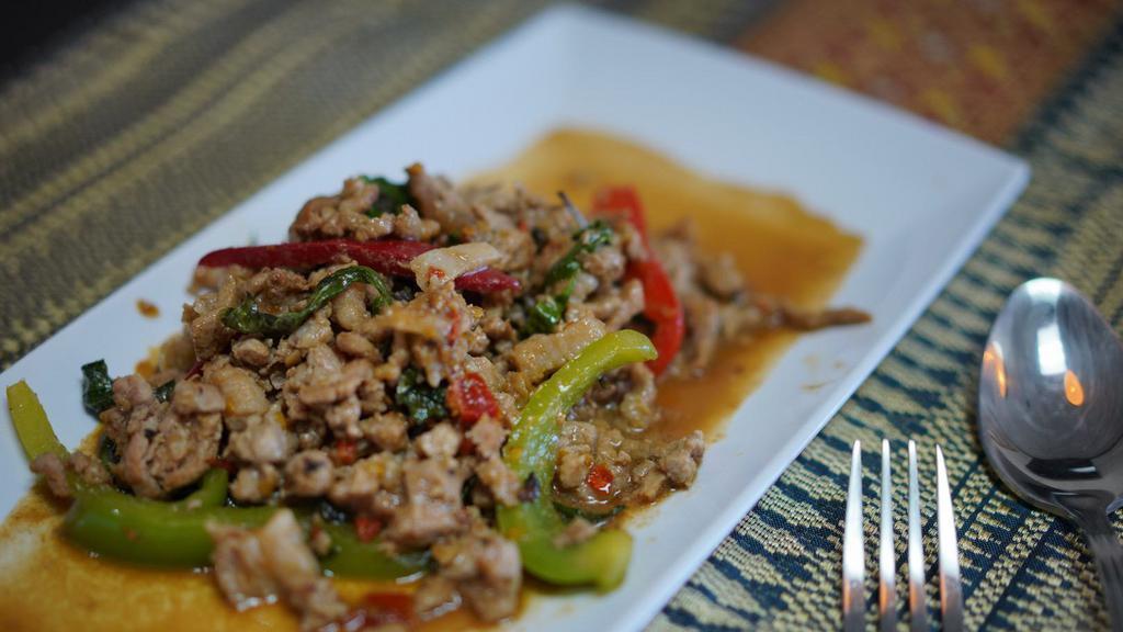 Spicy Basil · Sautéed with minced garlic and chilies, bell peppers and basil leaves.