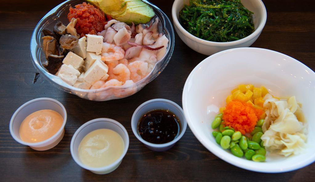 Large Poke Bowl · Build your own poke bowl with your choice of base, protein, mix-ins, spicyness, toppings, and sauce.