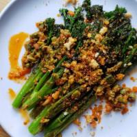 Broccolini A La Plancha · Chopped olives,  calabrian chilies, breadcrumbs.  Vegan