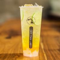 Golden Beach · sparkling water, mango syrup, lime slices.