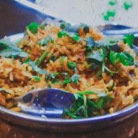 Biryani · Medium spiced, cooked with basmati rice, saffron, biryani spices and floral waters served wi...