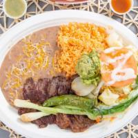 #16 Carne Asada · Carne Asada comes with a side of rice, beans, salad and guacamole