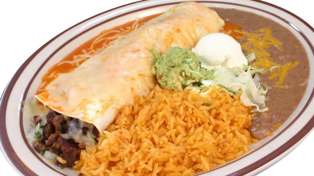 #8 Burrito Plate · Wet burrito with red sauce comes with beans, cheese, onions, cilantro, salsa, choice of meat and a side of rice, beans, sour cream and guacamole.