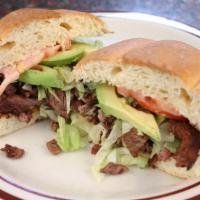 #6  Torta · Mexican Sandwich comes with tomato, onions, cilantro, mayo, lettuce, avocado, and choice of ...