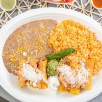 #10 Taquitos Rancheros · Chicken only. 
Fried taquitos comes with rice, beans, sour cream, guacamole, tomato, lettuce...