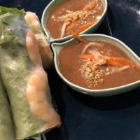 Goi Cuon - Spring Rolls · Rice paper wrapped with vermicelli noodles, lettuce, bean sprouts, mint and service with pea...
