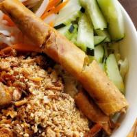 Grilled Pork, Egg Roll · Serving with vermicelli noodle and mixed vegetables.