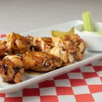 Metropolitan Whiskey Wings · Crispy wing sections battered in our house special whiskey sauce