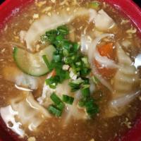 Ramen · Noodle soup, egg and gyoza. Served with one scoop of steamed rice.