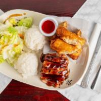 Chicken & Gyoza (5 Pieces) · Chicken teriyaki and six pieces of potstickers served with steamed rice and salad.