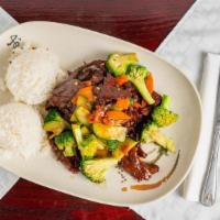 Broccoli Beef · Served with steamed rice.