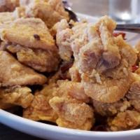 飘香辣子鸡   Spicy Diced Chicken · Spicy. Deep-fried diced chicken breast served with chili peppers.