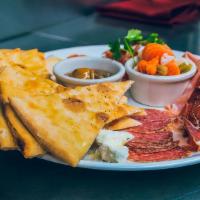 Antipasto Della Casa · Assortment of fresh Italian cold cuts served with a fresh Crostino focaccia . serving for on...