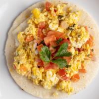 Arepa Traditional · Arepa with queso fresco, two scrambled eggs, and our housemade pico de gallo