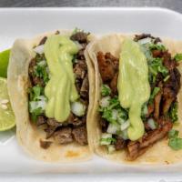 Tacos · Choice of meat on a hand pressed corn tortilla or flour tortilla. Toppings include; cilantro...