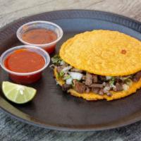 Mulitas · Two tortillas, melted cheese, choice of meat. Toppings include; cilantro, onion, and tomato ...